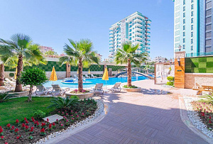 Квартира 1+1 в комплексе Olimpia Garden с богатой инфраструктурой