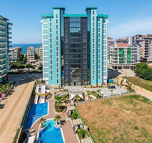 Квартира 1+1 в комплексе Olimpia Garden с богатой инфраструктурой