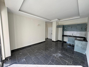 Квартира 1+1 в Tekinoğlu Residence рядом с морем
