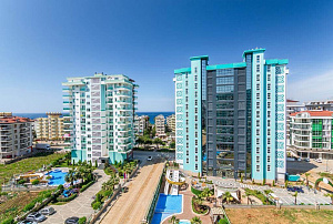 Квартира 1+1 в комплексе Olimpia Garden с богатой инфраструктурой