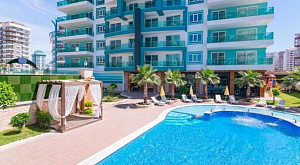 Квартира 1+1 в комплексе Olimpia Garden с богатой инфраструктурой